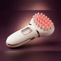 Red light scalp care comb on deep plum studio backdrop